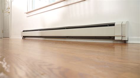 how many electric box heaters needed to heat a home|electric baseboard heater size calculator.